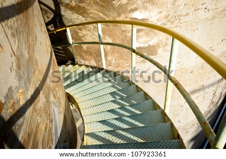 steel spiral down stairs on storage tank