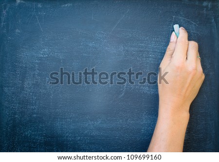 writing with chalk on black board