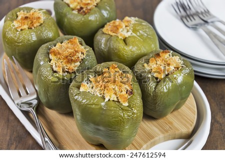 Green bell peppers stuffed with ground beef and rice