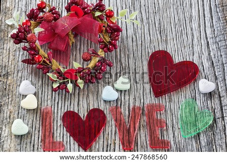 Valentine\'s Day Love message on a rustic wood background