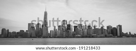 A black and white image of the Lower Manhattan Skyline with the World Trade Center Freedom Tower; panoramic format