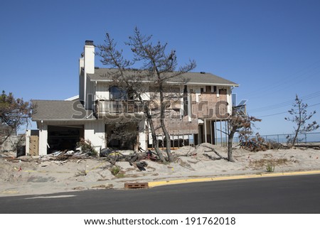 LOCH ARBOUR, NJ - OCTOBER 15: The ruins of a home in Loch Arbour, New Jersey, almost one year after Hurricane Sandy.  Photo taken October 15, 2013.