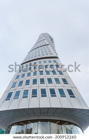 MALMO - JANUARY1: Turning Torso skyscraper on January 1, 2014 in Malmo, Sweden. Designed by Santiago Calatrava, it is the most recognized landmark of Malmo today.