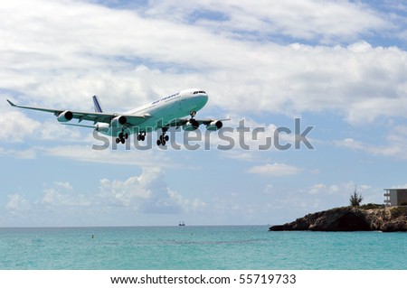 ST MARTIN, ANTILLES - APRIL 13: the tourist office and Air France signs an agreement to strengthen their partnership (joint communication plan). Daily A340 about to touch down in Apr. 2010 at SXM.