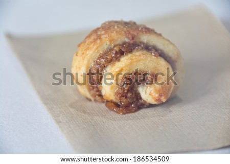 This pastry features sweet cinnamon rolled in a pastry crust.