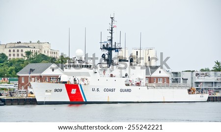 Portsmouth, NH, USA - August 2, 2014: USCG ship 909 is docked at the Portsmouth Naval Shipyard on this Saturday afternoon in mid-summer.