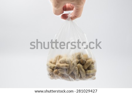 Steam Peanuts in the shell in plastic bag, Thai local snack.
