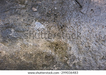 wet old grungy cement or concrete pavement background or texture