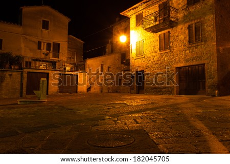mysterious narrow alley with lanterns at night