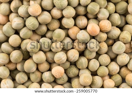 Whole dried green peas full frame as a background
