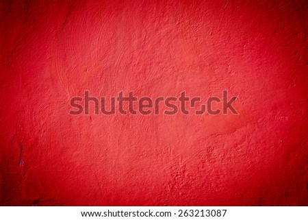 Red burgundy texture background with bright center spotlight