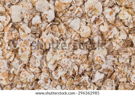 Close up of porridge oats as background or texture. Diet and healthy nutrition