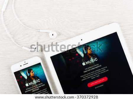 Moscow, Russia - January 30, 2016: Apple music application on the display of iphone and ipad gadgets. Apple Music is a music streaming service developed by Apple Inc.