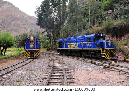 OLLANTAYTAMBO, PERU - MAY 14: Train to Machu Picchu pueblo arrives to Ollantaytambo station on May 14, 2013 in Ollantaytambo-settlment, Peru.