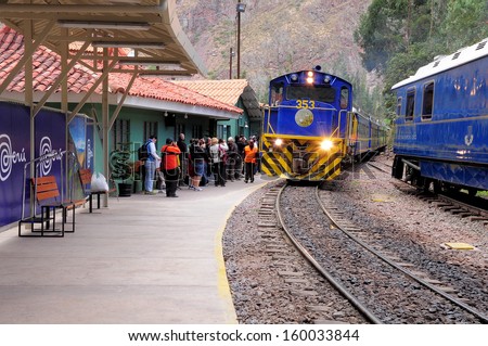 OLLANTAYTAMBO, PERU - MAY 14: Train to Machu Picchu pueblo arrives to Ollantaytambo station on May 14, 2013 in Ollantaytambo-settlment, Peru.