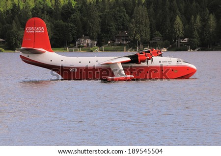 VANCOUVER ISLAND, CANADA - JUNE 21: Firefighter plane on Sproat lake on Vancouver island on June 21, 2011, Canada.