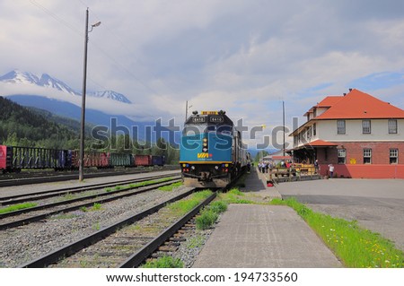 SMITHERS, CANADA-JUNE 26: Passenger train from Prince Rupert to Prince George stands on the station for changing locomotive crew on June 26, 2011 in Smithers, British Columbia, Canada.
