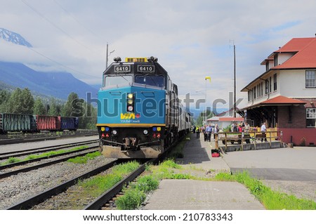 SMITHERS, CANADA-JUNE 26: Passenger train from Prince Rupert to Prince George stands on the station for changing locomotive crew on June 26, 2011 in Smithers, British Columbia, Canada.