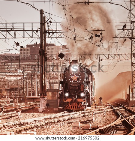 Departure of the retro steam train. Vintage image.