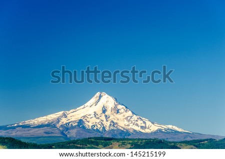 Beautiful snow covered Mt. Hood and a deep blue sky in Oregon, USA