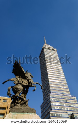 Latin American Tower, first skyscraper in Mexico City and statue