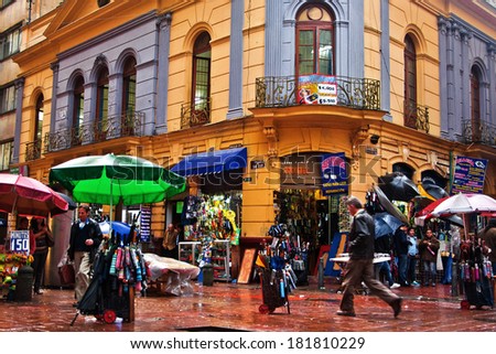 BOGOTA, COLOMBIA - JANUARY 27: People pass by a busy street corner in Bogota, Colombia on January 27, 2012