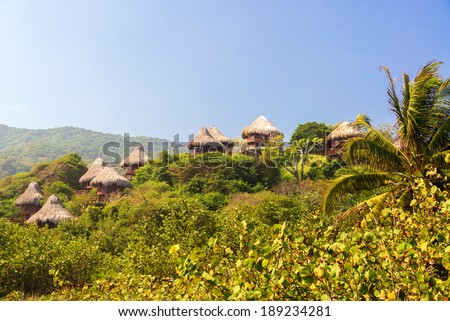 Rustic huts in a jungle in Tayrona National Park near Santa Marta Colombia Rustic huts in a jungle in Tayrona National Park near Santa Marta Colombia