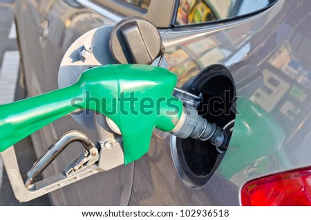 refilling the car with fuel on a filling station