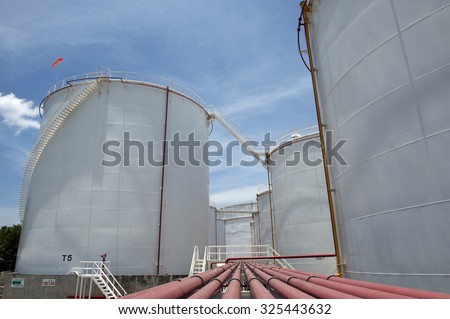 large white Industrial tanks for petrol and oil