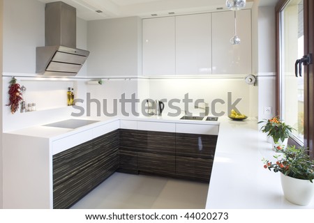 Close up details of luxurious modern fitted kitchen in home.