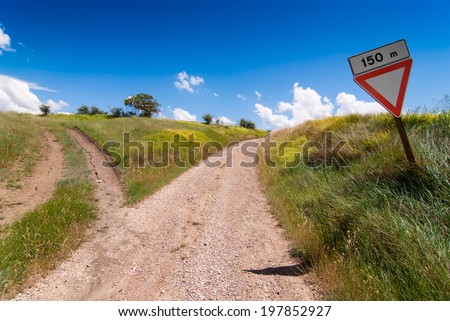 Forked road in the countryside,Tuscany, Italy.