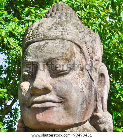 Stone face in Angkor Wat Area, near Siem Reap, Cambodia, Southeast Asia