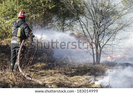 Firefighters fighting fire