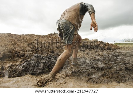 Mud race runners