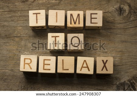 Time To Relax text on a wooden cubes