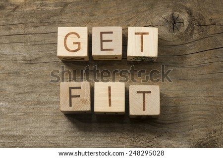 Get Fit text on a wooden background