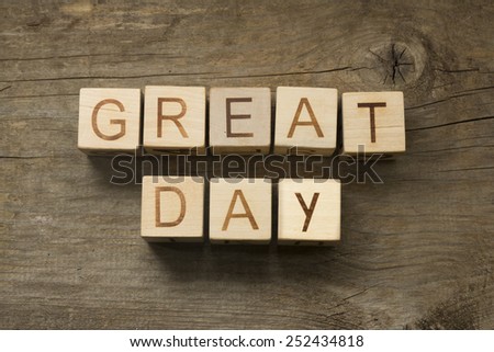 Great day text on a wooden background
