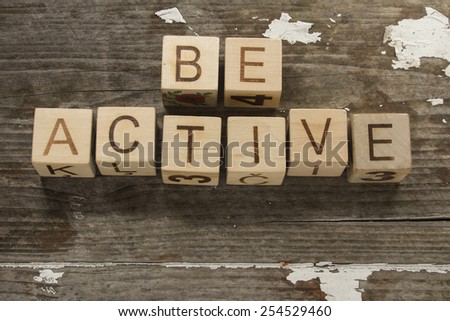 be active text on a wooden background