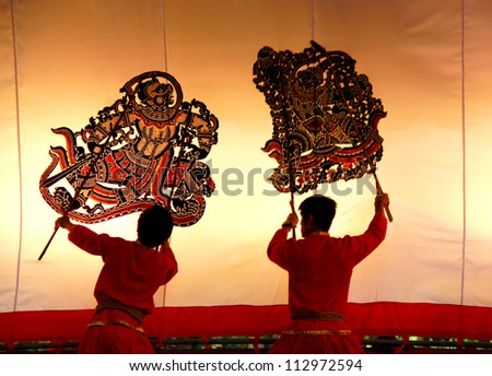 RATCHBURI, THAILAND - JUNE 26 : Large Shadow Play performed at Wat Khanon on June 26, 2011. Large Shadow Play or Nang Yai is a performing art which Wat Khanon tries to preserve as a Thai heritage