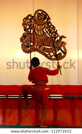 RATCHBURI, THAILAND - JUNE 26 : Large Shadow Play performed at Wat Khanon on June 26, 2011. Large Shadow Play or Nang Yai is a performing art which Wat Khanon tries to preserve as a Thai heritage