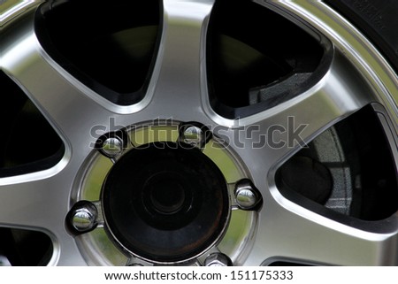 Close up of an isolated modern aluminum alloy wheel