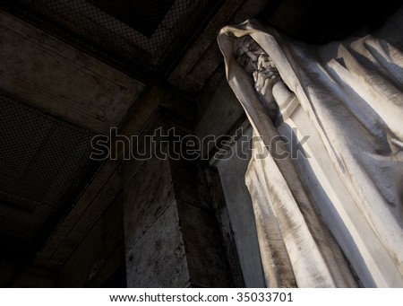stock photo mortal statue from a graveyard