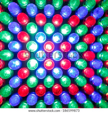 Red Green Blue (RGB) LED light bulb close up, soft focus