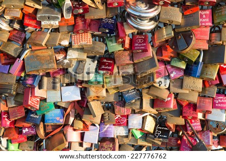 COLOGNE, GERMANY NOVEMBER 1ST 2014 -  To prove their love, couples fix padlocks to the railings of Hohenzollern Bridge in Cologne, to ensure it is everlasting they throw the key into the river below.