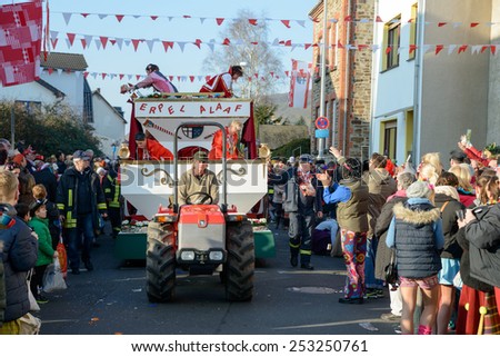 ERPEL, GERMANY 15 FEBRUARY 2015 - Unidentified persons celebrating a carnival procession to celebrate the end of Karneval season, an annual event held throughout certain regions in Germany