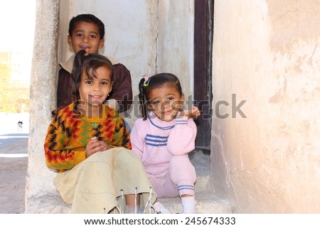 TARIM, YEMEN, DECEMBER 2008: unidentified children who look forward to be photographed by tourists on December 23, 2008 in Tarim. Yemenis are happy when tourists make photos from them.