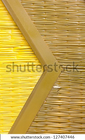 Bamboo mat background painting with yellow and brown.