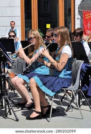 TRIESTE, ITALY - JUN 24, 2012: Street performance of the Slovenian brass band Pihalni Orkester Marezige during the 