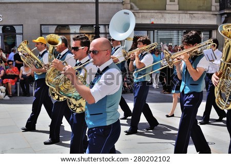TRIESTE, ITALY - JUN 24, 2012: Street performance of the Slovenian brass band Pihalni Orkester Marezige during the \