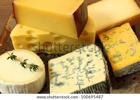 Cheese plate - various types of soft and hard cheese.